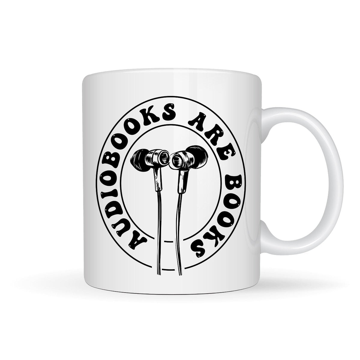 White ceramic mug with 'Audiobooks are Books' text and a graphic of headphones on the front side.